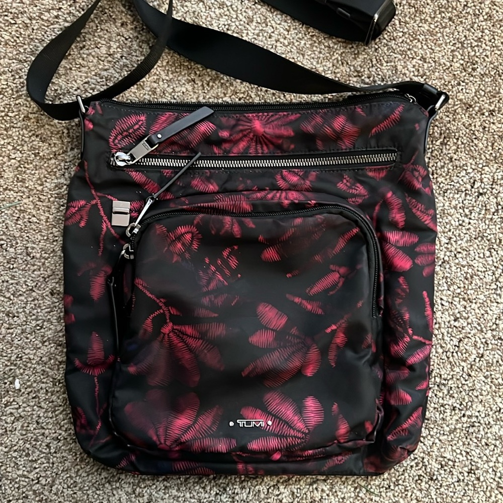 Tumi crossbody bag.  Like new.